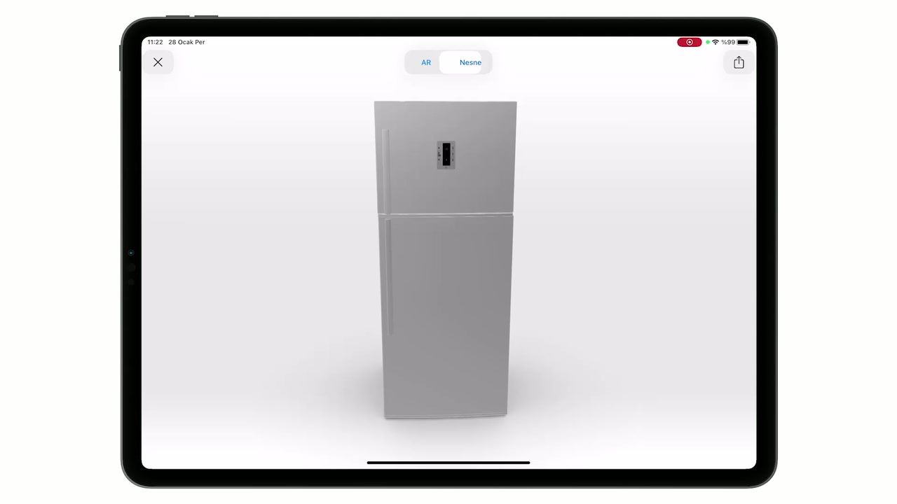 iPad ekranında AR ile odaya yerleştirilmiş bir buzdolabı modeli